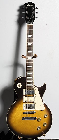 Late-’70s Ibanez Model 2351 in Tobacco Brown Sunburst finish with “faux” DiMarzio Super Distortion middle pickup added for cosmetics (not wired).