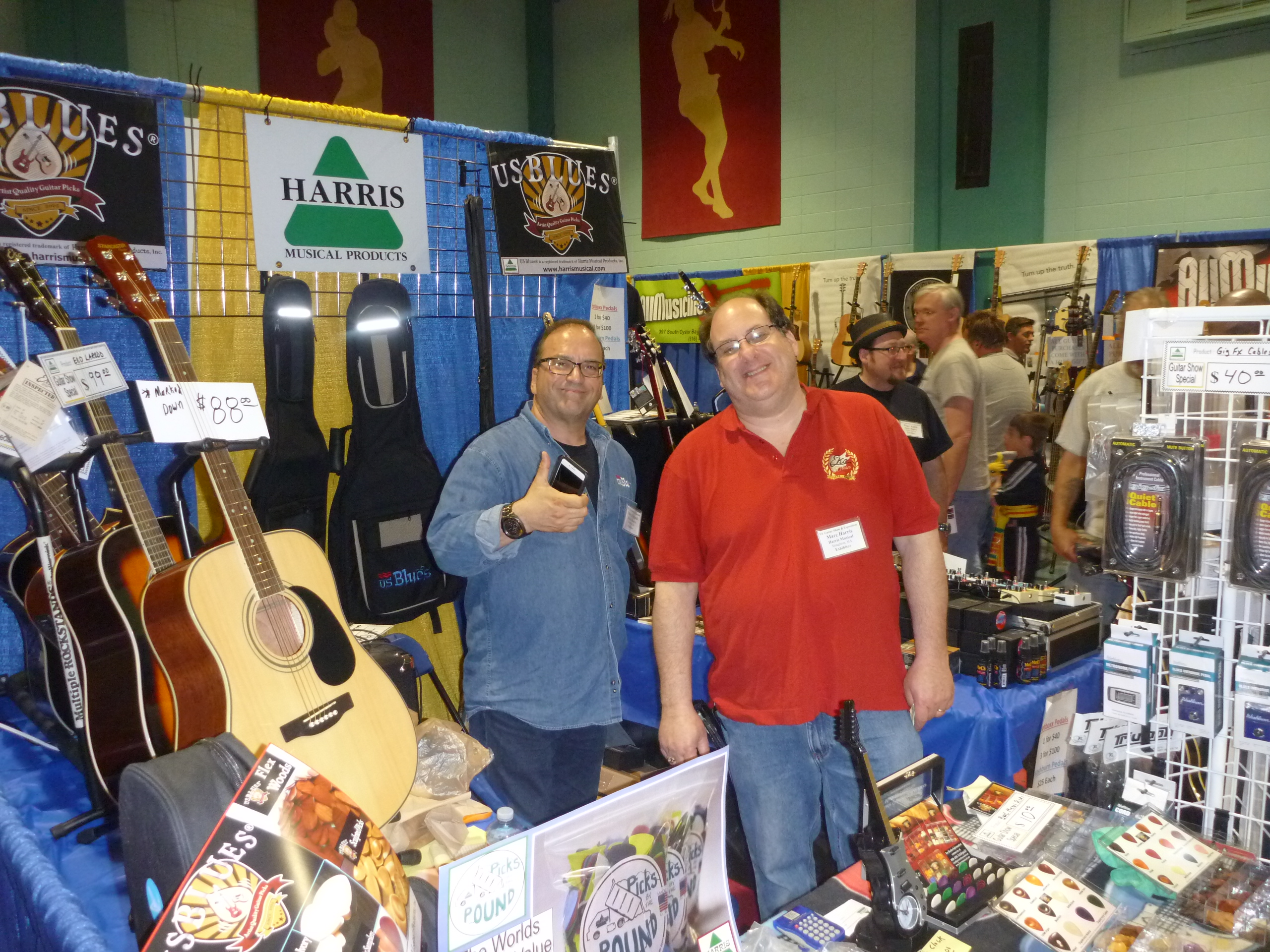 The Harris brothers show they are enjoying the 4th Annual NY Guitar Show.