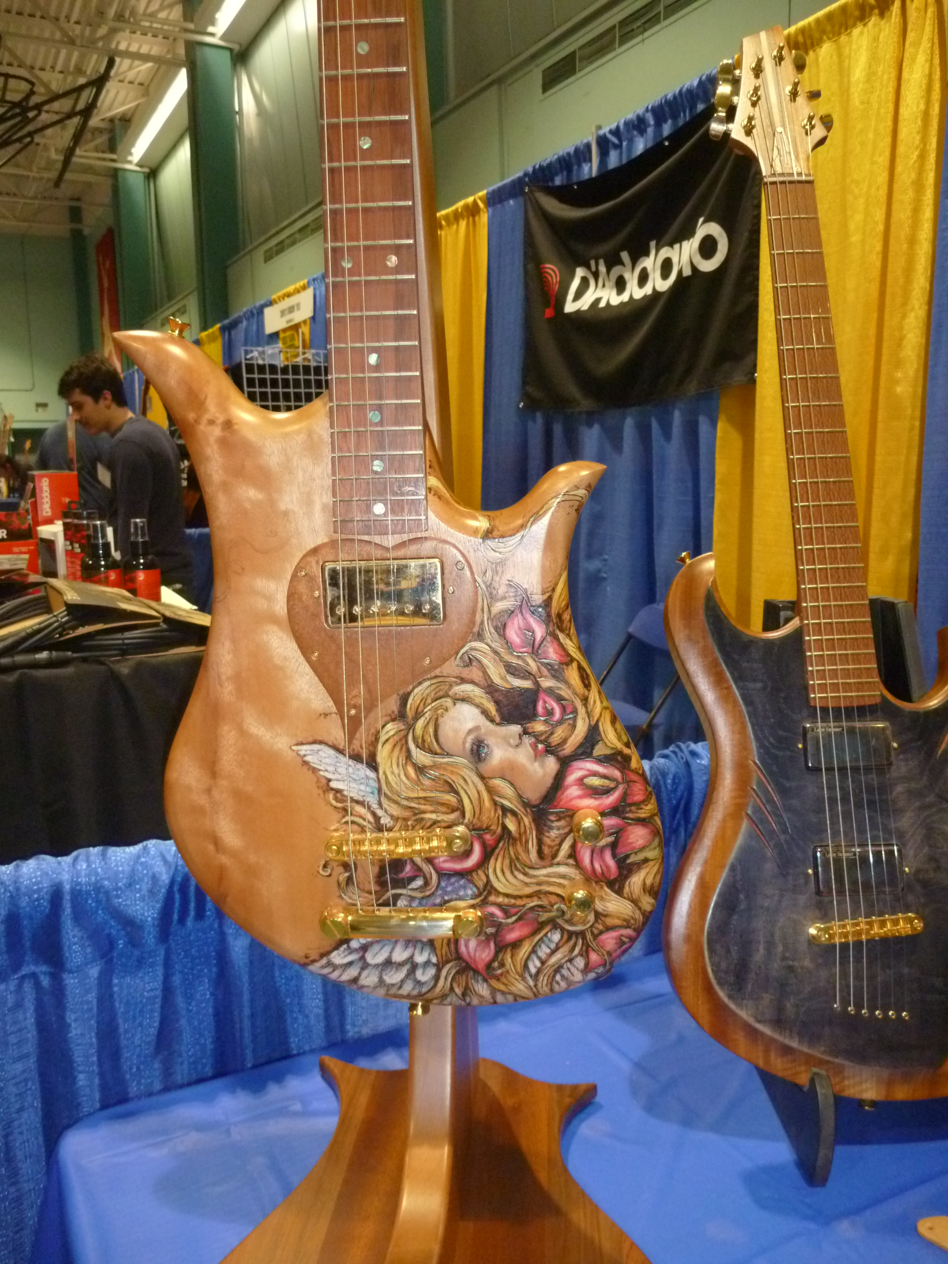 Beautiful work indeed by Paul Girouard of Girouard Guitars.