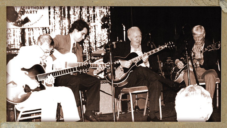 Bauer (right) in the mid ’90s with Bucky Pizzarelli, Howard Alden, and Herb Ellis at a birthday party for jazz sax/clarinet player Flip Phillips.