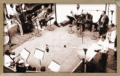 This session at Carnegie Hall in 1957 was recorded and released as Cootie and Rex, The Big Challenge. The band included Bauer on guitar, Rex Stewart, Cootie Williams, bassist Milt Hinton, and drummer Gus Johnson.