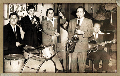 Bauer peeks out from behind bandleader Charlie Ventura in the late ’40s.