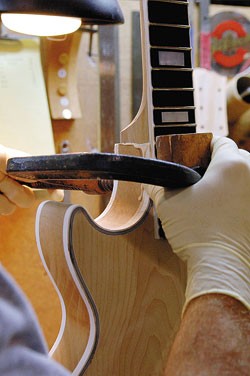A freshly set neck gets the clamp A freshly set neck gets the clamp