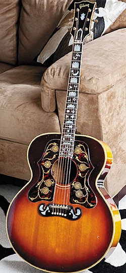 This '65 Gibson J-100 was ordered from the factory with two pickguards - one for a J-100 and a J-200.