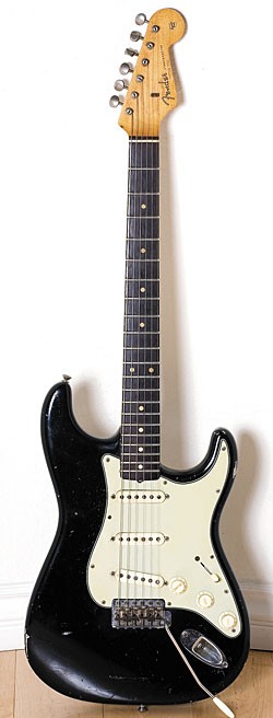 Late-'64/mid-'65 Fender Stratocaster in black.