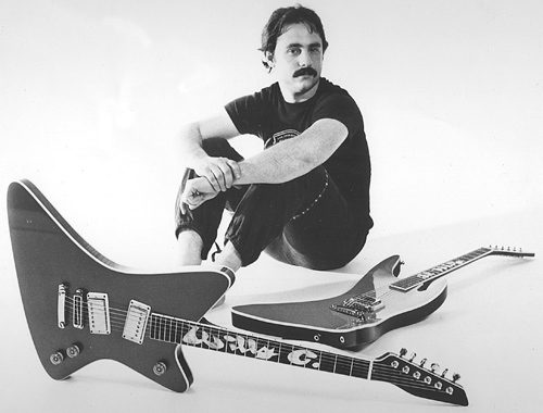 Hendrick in the ’80s with a pair of guitars made for Billy F Gibbons.