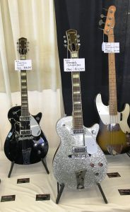 A 1956 Gretsch Duo Jet, a '56 Gretsch SIlver Jet and '57 Fender P-Bass