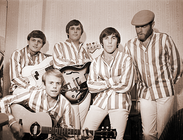 The Beach Boys in their trademark striped shirts prior to a concert in their glory year of 1964. Photos courtesy of Capitol Photo Archives.