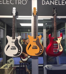Big things are happening in the Danelectro booth at#NAMM2016. Including the first spruce electric (far left) and curve top (far right). 