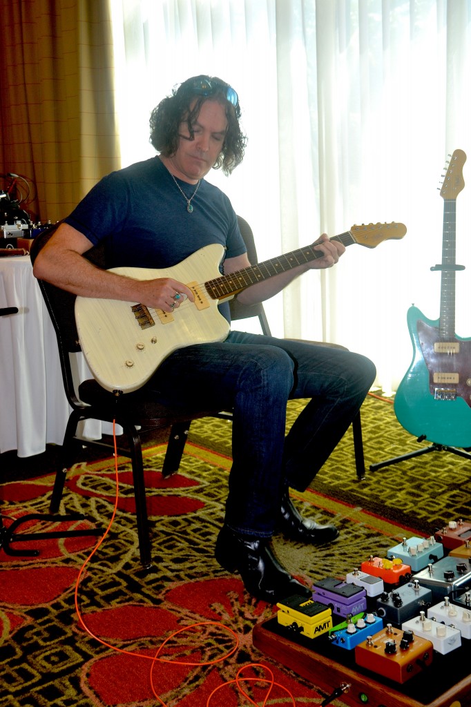 Phil Woodward riffing at TMG Guitars.