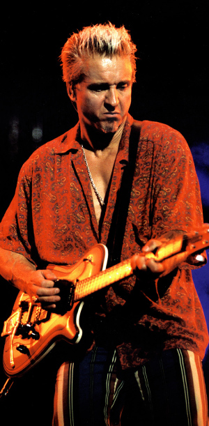 Neil Giraldo live in 2002 with one of his custom GMP guitars. Photo: Matt Touchard.