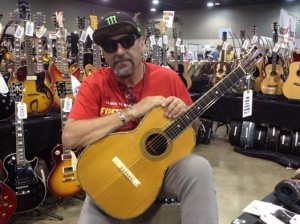Gary Hernandez of a Guitars West with a 1908 Martin 00-42.