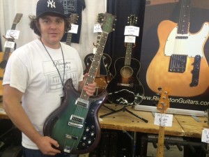 Howie Statland showing off a Kustom K200 in Wineburst.
