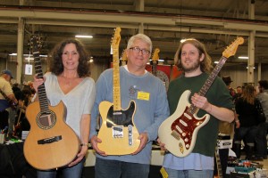 Janet Stites, Rick Hogue and Jon Bookstein of Garrett Park Guitars with an Olson 2002 acoustic, a new Fender Custom Shop Junkyard Dog '51 Tele (limited edition run for Garrett Park Guitars), and 2004 Fender Custom Shop John Cruz Strat