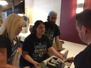 Karla, Karly and Grayson [Prather] stamping at the entrance.