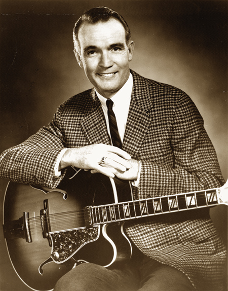 Smith with his signature model Gibson. Johnny Smith courtesy of Mel Bay Publications.