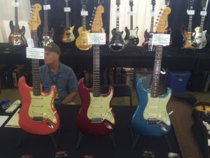 Three shades of Stratocaster - '63 Fiesta Red, '64 Candy Apple Red, and '65 Lake Placid Blue.