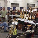 Jim Singleton and Joe Menza at the Best Guitars booth.