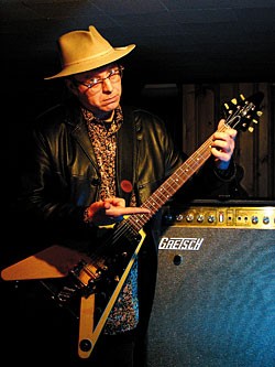The V is a reissue, but the solidstate Gretsch Nashville amp is all original The V is a reissue, but the solidstate Gretsch Nashville amp is all original