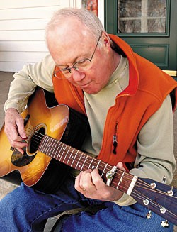 Dan Erlewine strums the Martin M-21.