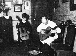 Josefa (left) and Francisco Simplicio working in their home.