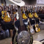 A Dobro with a hat.
